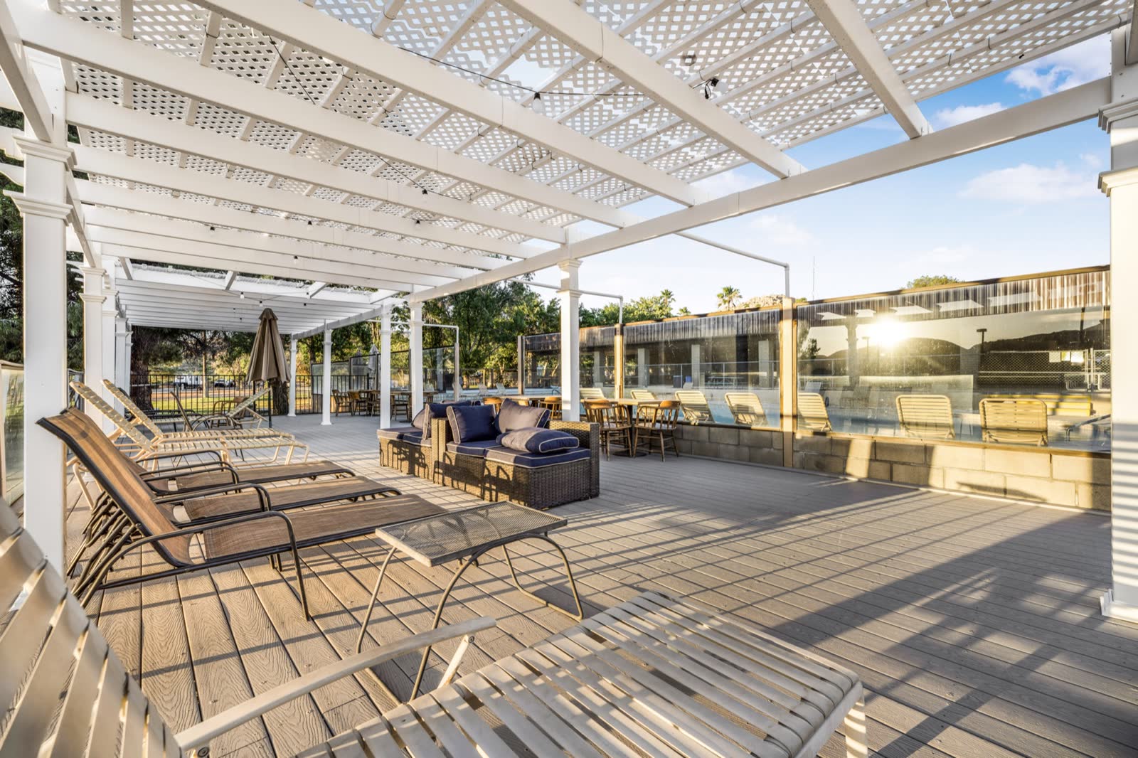 Pool terrace and shaded lounge at the existing property